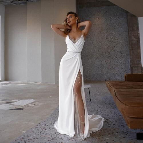 Sexy White Beach Wedding Dresses Mermaid Bridal Gowns Spaghetti Straps Tulle Silver Hot Rhinestones Princess Party Dress