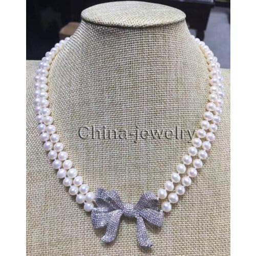 P7526 - 2row 17-18" 8-9mm white round freshwater pearl necklace - zircon bowknot