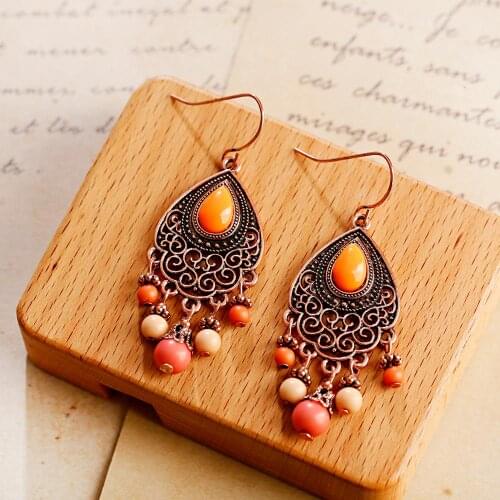 Vintage Bohemian Style Fashion Pendant Earrings Drop Shaped Copper Hollow Geometric Pattern Pendant Orange Bead Earrings 2020
