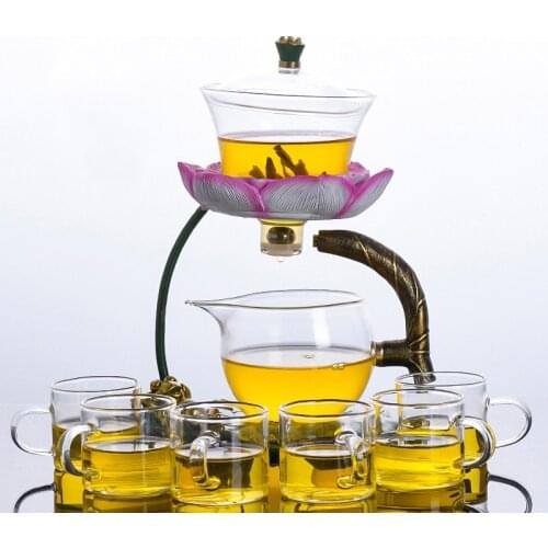 New glass tea set lotus magnetic water diversion rotating cover bowl semi-automatic tea maker lazy teapot