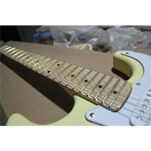 Custom 6 string milk yellow guitar,yngwie signature, scallop fretboard,tremolo bridge,SSS pickups,chrome button