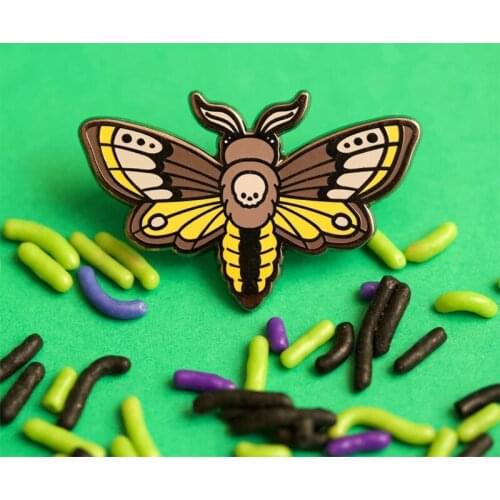 This sweet and mysterious Deaths-Head Hawkmoth brooch pin is perfect for your favorite jacket, vest, or tote