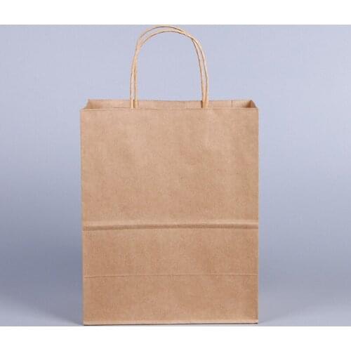 10PCS/lot kraft paper color paper bag with handle DIY Multifunction clothes Shopping bag Fashionable gift paper bag 27x21x11cm