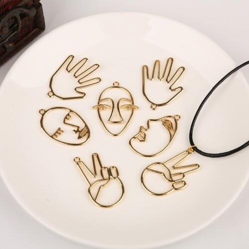 Fashion Design 4Pcs Gold Color Punk Rock Pendant Hollow Face&Hand Shape For DIY Necklace Earring Jewelry Findings Making