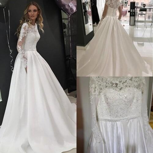 Tulle High Neckline A-Line Wedding Dresses Long Sleeves Crystals Bridal Gown Button Down Wedding Gowns Vestido De Noiva Mariage