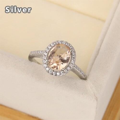 European and American S925 Silver Ring womens fashion diamond inlaid with oval egg shaped champagne Topaz color gem gift