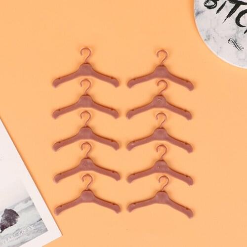 10PCS Lovely Hangers Mini Cute Wardrobe Girls Doll Dress Coat Clothes Plastic Accessories Baby Toys
