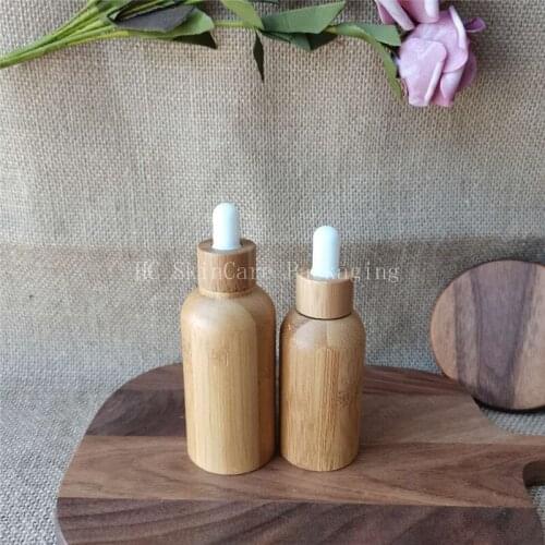 High quality 100pcs/lot Biodegradable bamboo emulsion dropper bottle white rubber Skincare Cosmetic packaging container