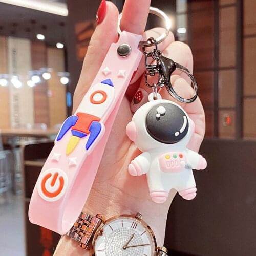 Astronaut keychain female cute Korean couple key chain male soft rubber small pendant key ring ornaments