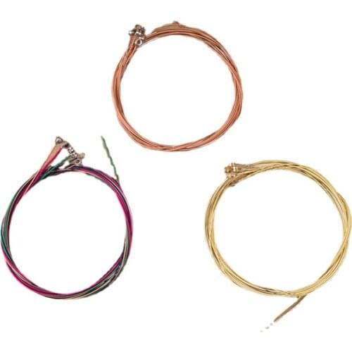 Acoustic guitar strings, brass strings, copper colored strings, tools, musical instrument accessories
