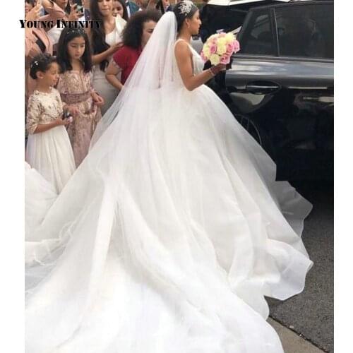 On Sale Ball Gown Wedding Dress 2020 Bridal Gown Sexy Deep V Neck Beading Illusion White Formal Wear Saudi Arabia Custom Made