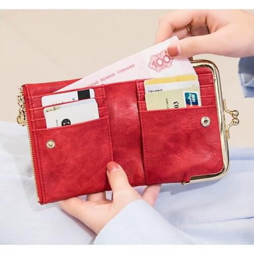 Short purse female 2021 new clip zero purse retro multifunctional folding wallet card bag female