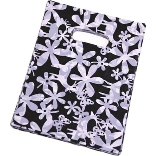 2017 Hot Sale Wholesale 100pcs/lot 15*20cm Luxury Black Fashion Shopping Packaging Bags With White Flower Plastic Gift Bags