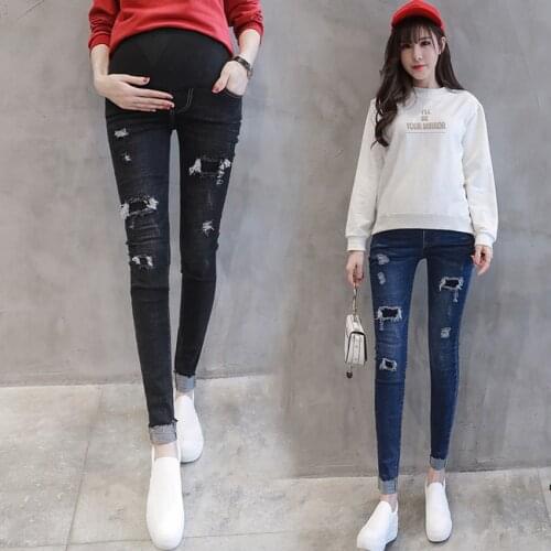 Spring and summer black Korean version of high elastic hole pregnant women pants pregnant women denim pants pants leggings