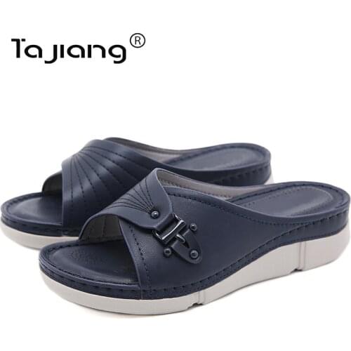 Ta Jiang New thick-soled slope heel slippers European and American fashion hollow summer female gladiator beach slippers T777-4