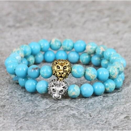 2020 New Design High Grade Jewelry 8mm Sky Blue Sea Sediment Stone Bead with Bronze Gold and Silver Lion Hand Bracelet