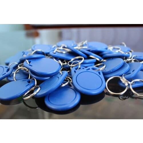 100pcs NTAG215 NFC Token Card RFID Tag key fob 13.56MHz Keychain for All NFC android Phone TagMo Switch