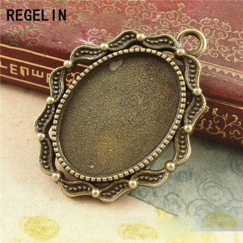 REGELIN High Qualtity 10pcs/lot Antique silver filigree cameo cabochon base setting pendant tray 18*25mm Jewelry Blanks