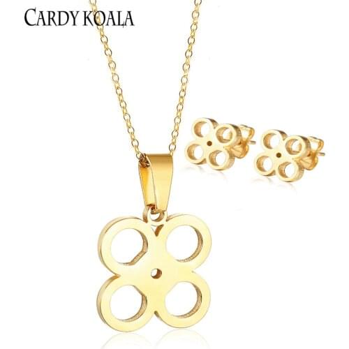 Circle hollow small flower titanium steel pendant pendant necklace earrings set small fresh gold-plated childrens earrings firs