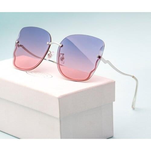 New Sunglasses Ladies Fashion Frameless Diamond Inlaid Nylon Sunglasses Female Fashion Butterfly Sunglasses Wholesale 6170