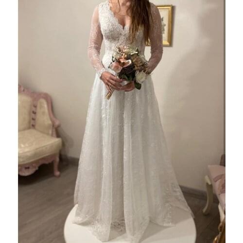 Wedding Dress A-Line V-Neck Full Sleeve Lace Appliques Sequined Backless Floor Length Sweep Train Gorgeous Bride Gown 2021