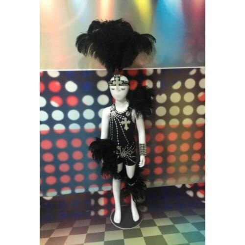 Boy model, catwalk, costume, feather, stage costume, boys swimsuit, runway show, feather backboard