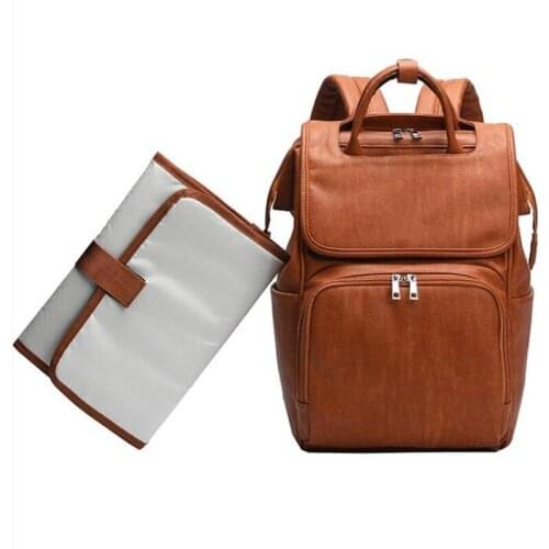 New Unisex Fashion Quality PU Leather Baby Diaper Bag Backpack+Changing Pad+Stroller Straps