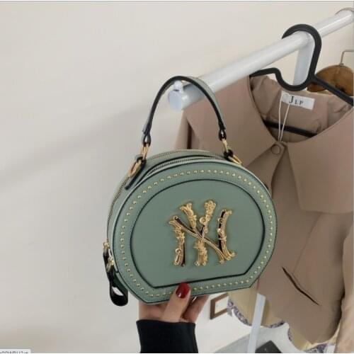 New bag women 2021 fashion womens bag rivet single shoulder womens bag comfortable portable womens bag trend semicircle bag