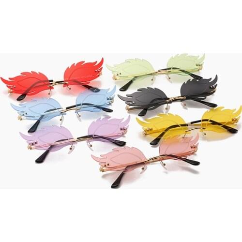 Luxury Fashion Flame Feather Sunglasses Ladies Frameless Fish Sunglasses Retro Ladies Metal Glasses UV400 Ocean Tablets