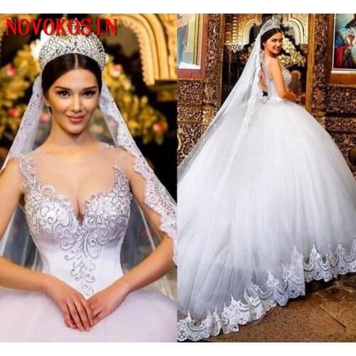 Puffy Ball Gown Wedding Dresses 2019 Lace Applique Beads Crystal Hollow Back Royal Train Plus Size Formal Bridal Gown