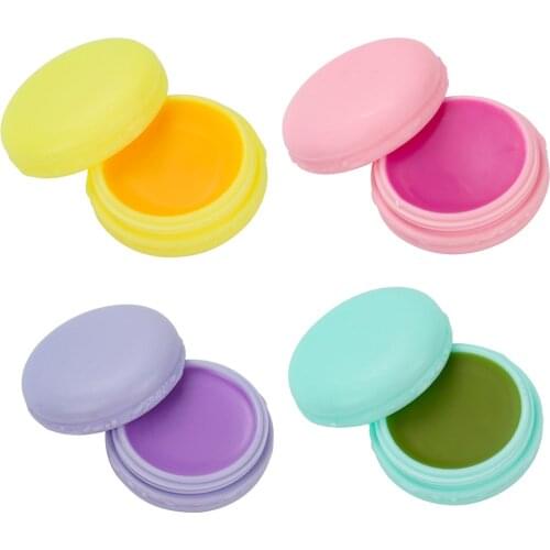 Four-color Fruit-scented Vaseline Repairing Lip Balm Private Label Moisturizing Exfoliating Lip Mask Mango strawberry flavor