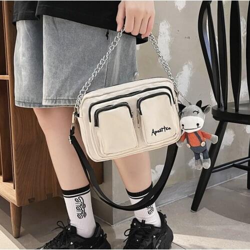 Nylon shoulder messenger bag female bag new double pocket Japanese simple student shopping chain small shoulder bag with pendant