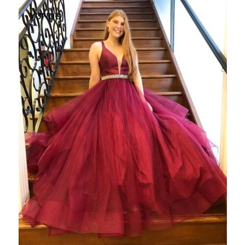 YUNUO Burgundy Prom Dresses Tulle Ball Gown Low Cut Illusion Neck Special Occasion Dress Silver Beaded Belt Evening Gowns