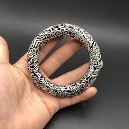 Hollowed out Dragon Phoenix bracelet jewelry national style pure handmade Miao silver hollow thick round bracelet