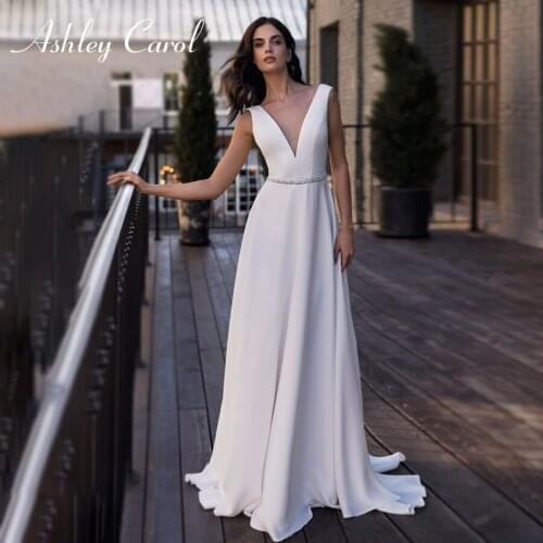 Ashley Carol A-Line Wedding Dress 2021 Elegant Satin Backless Beach Bride Dresses Sexy V-Neckline Sashes Sleeveless Bridal Gown