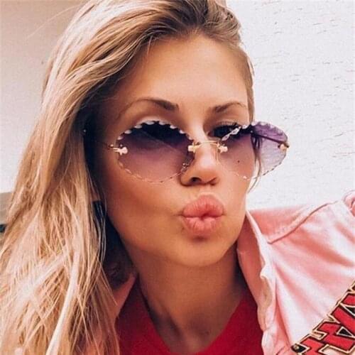 New Popular Small Rimless Sunglasses Ladies Luxury Designer Brand 90S Vintage Purple Oval Sunglasses Male Oculos De Sol