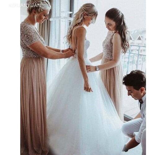 Boho A-line Wedding Dress Spaghetti Straps Appliques Beading Open Back Bridal Dress Chapel Train Elegant Backless Robe De Mariee