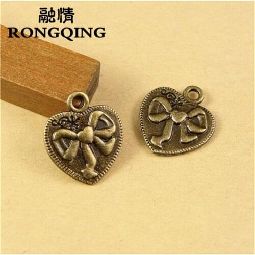 RONGQING 100pcs/lot 18*16MM Bow tie love Bronze Charms handmade Craft pendant making fit DIY for bracelet necklace