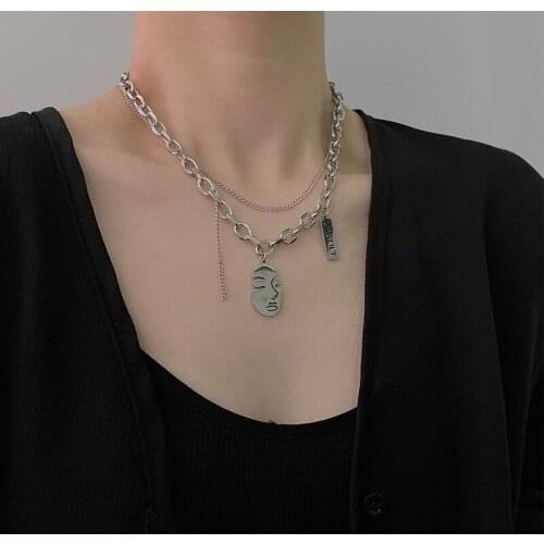 U-Magical Exaggerated Titanium Steel Hollow Human Face Pendant Necklace for Women Chunky Chain Asymmetry Necklace Jewellery