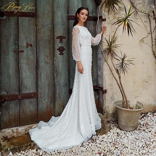 Beach Mermaid Long Sleeves Wedding Dresses 2020 New Boat Neck Sexy Pearls White Boho Bridal Gowns Illusion Lattern Sleeves