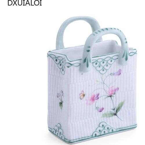 Nordic creative painting, bag ceramic vase decoration, indoor living room desktop flower arrangement, vase home decoration