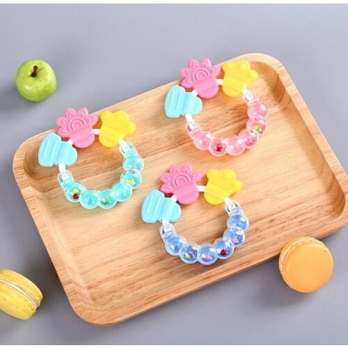 New born Baby rattles Teether Toy Teeth Biting For Babies Baby Rattle toddler Bed Bell Silicone Handbell Jingle Cartoon random