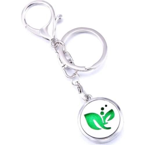 Delicate Leaves Fashion Perfume Aroma Locket Keychain Stainless Steel Aromatherapy Essential Oil Diffuser Box Keyring Jewelry