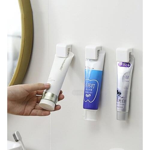Simple And Practical Bathroom Hanging Clip Multi-Purpose Cosmetic Brush Toothpaste Cleanser Self Adhesive Rack Bathroom Supplies