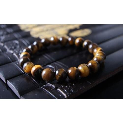 Manufacturers wholesale natural tigereye 8 mm to 12 mm 18 mm yellow tights bracelet Hand bead string