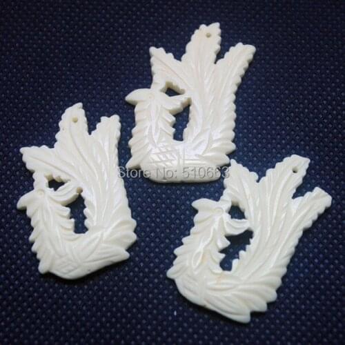 4 Pieces/ Lot Natural White Polished Carving Bovine Bone Ox Bone Material Cattle Phoenix Bird Of Wonder Shape Size: 30x45mm