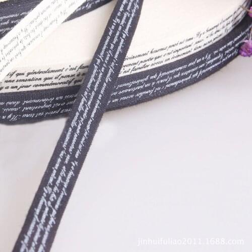 Custom 2cm one colors printing black cotton ribbon printed design patterned and Logo clothing Label ribbons 100 yards