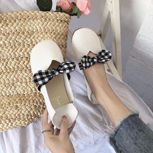Summer new Korean version of Harajuku style bow flat shoes wild shallow mouth retro two kinds of wearing slippers single shoes