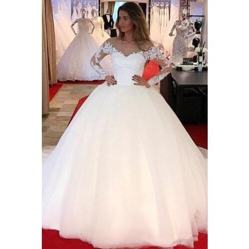 2019 Charming Lace Long Sleeve Wedding Dresses Off The Shoulder A Line Tulle Arabic Dubai Style Bridal Gown Custom Made Hot Sale