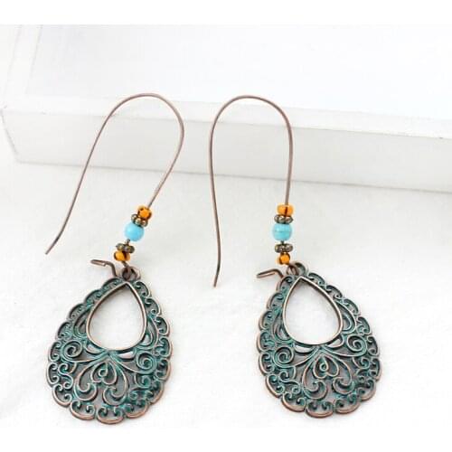 Retro Palace Style Hollow Drop Earrings Elliptical droplet shape Exaggerated eardrop Bead decorative jewelry Womens Brincos